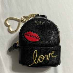 Black mini backpack keychain VS